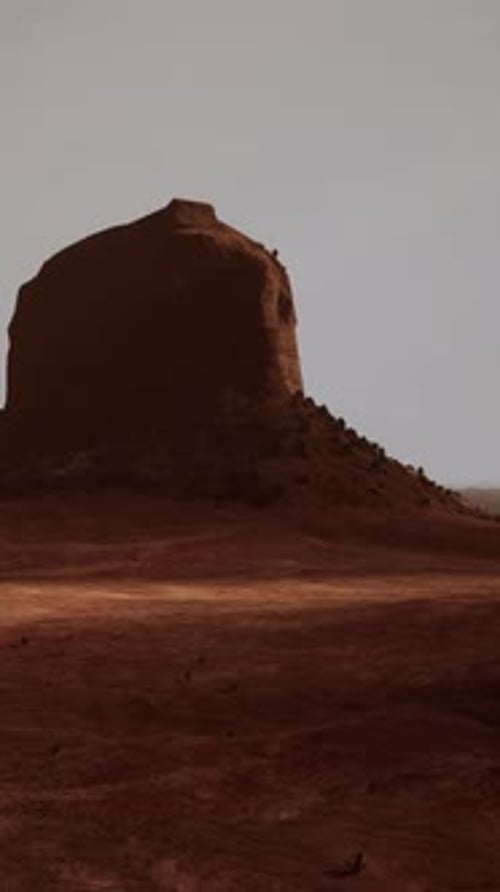 A Large Rock in the Middle of a Desert