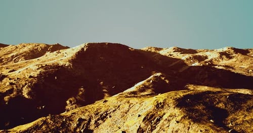 Majestic Mountain Landscape Under Clear Blue Sky During Daylight Hours