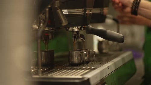 Coffee Machine Pouring Espresso Drinks in Cafe