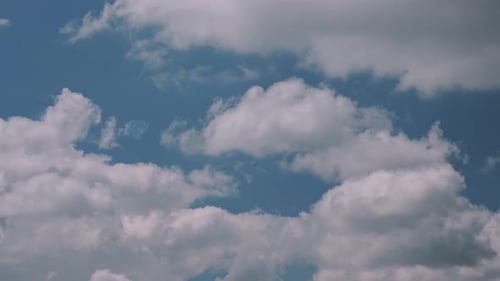 Time Lapse of Fluffy Clouds in Blue Sky