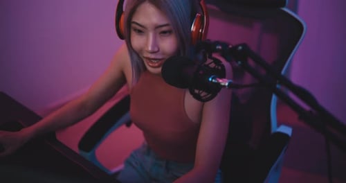 Excited Woman Playing Video Game at Home