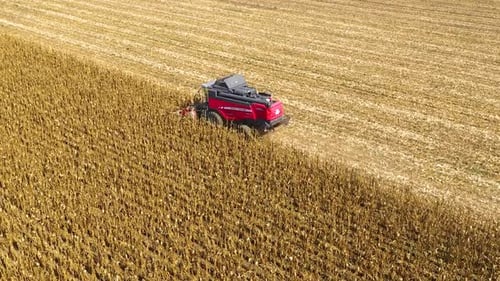 Aerial view of a harvester in sunflower field