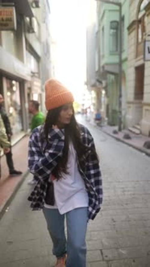 Casual Street Style Captured in an Urban Setting Perfectly Lit By the Sunsets Warm Glow