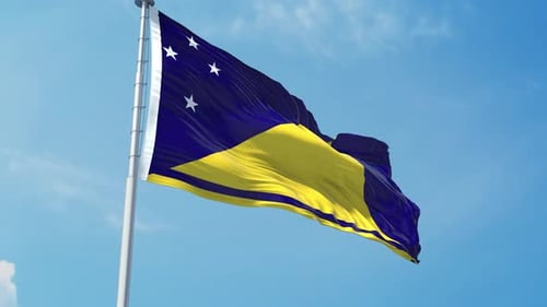Waving Tokelau Flag on a Pole Against Blue Sky