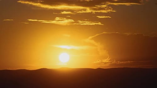 Golden Sunrise Over Mountains Time Lapse
