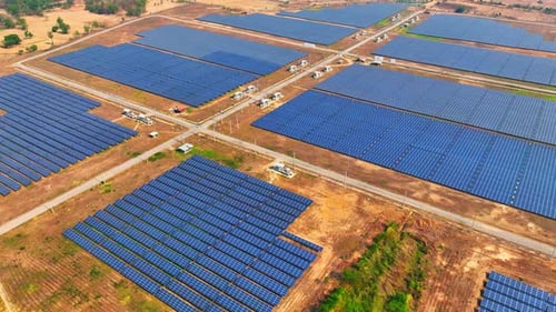Aerial view drone shows rows of solar panels arranged
