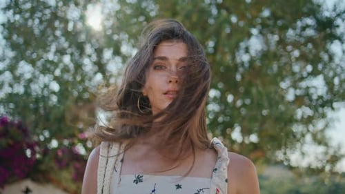 Woman in Sundress Posing in Tropical Setting