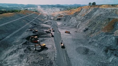 Aerial View of Quarry Mining Site with Heavy Machinery