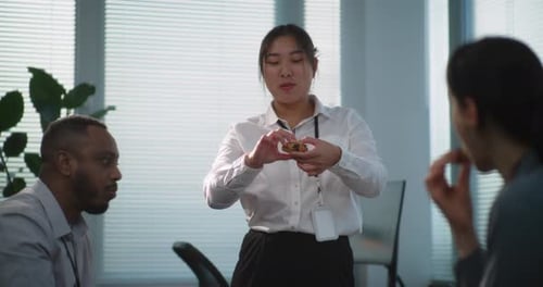 Group of Company Employees Talk and Eat Pizza in Call Center Office