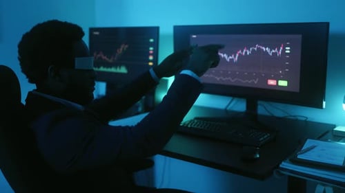 Financial analyst working on stock exchange market with futuristic virtual reality glasses