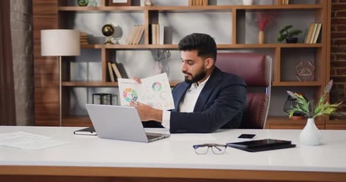 Man Making Online Video Call Chat Sitting at Modern Office Talking Into Laptop Webcam