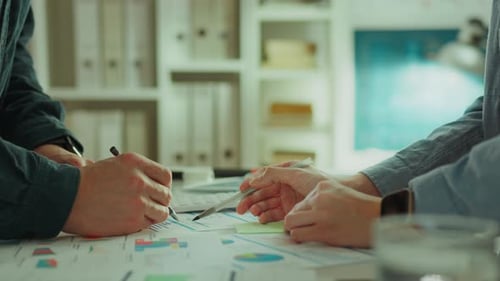 Business Team Working on Financial Data in Office