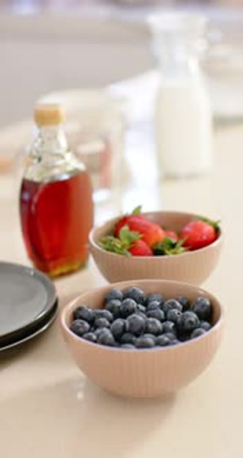 Fresh Blueberries and Strawberries with Maple Syrup for Breakfast
