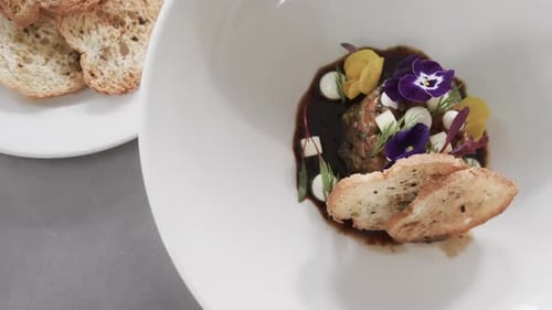 Exquisite Food Plating with Meatball, Flowers and Bread