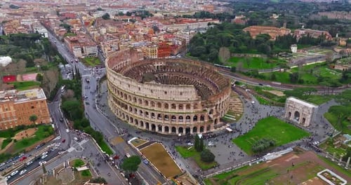Establishing Shot Drone Flying of the Colosseum Famous Ancient Roman Arena Downtown Rome Italy The