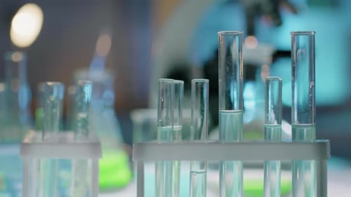 Lab Test Tubes and Microscope in Science Lab