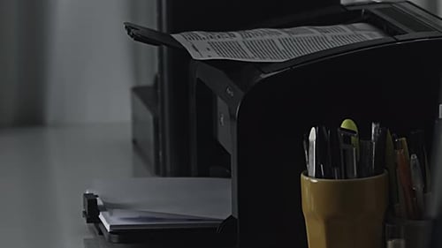 Printer Prints Document in Office Setting