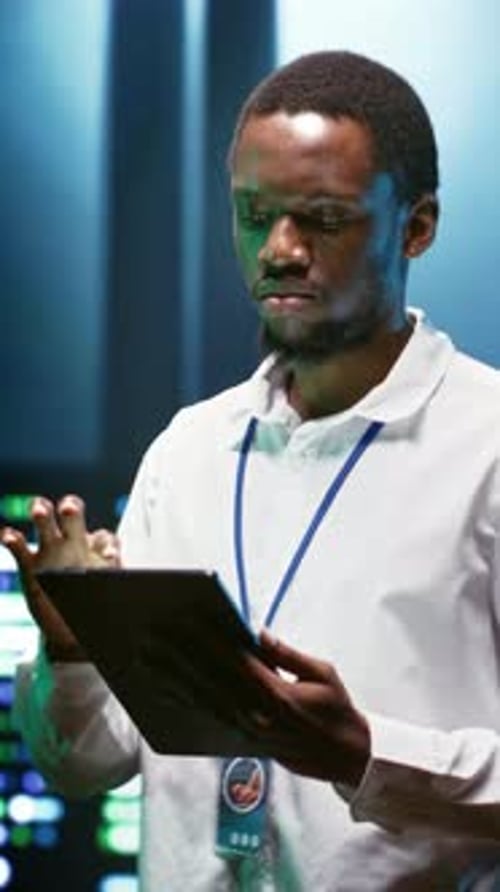 Vertical Video Specialist Checking Data Center Security