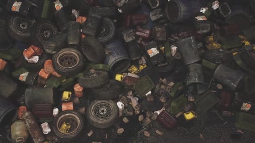 Discarded Tires and Containers in a Daytime Urban Recycling Area