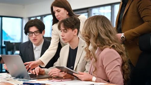 Business meeting in an office, workers discussing business affairs using gadgets and papers. Slow mo