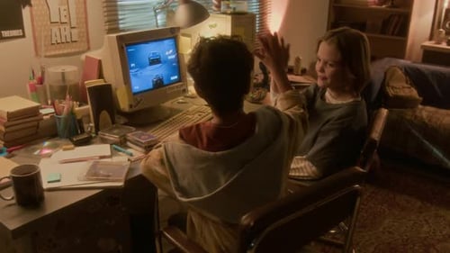 Two Children Playing Game on Retro Computer