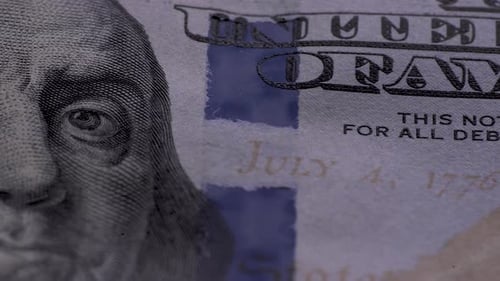Background with One Hundred Dollar Bills on a Rotating Platform