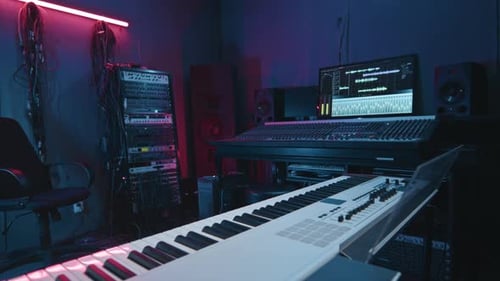 Electric Synthesizer and Sound Board with Screen Displaying Settings in Studio
