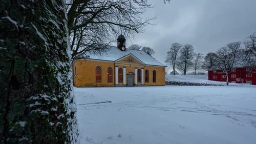 Historic Building on Snowy Grounds in Winter