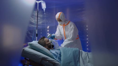 Doctor And Infected Patient In Hospital, Coronavirus Concept.