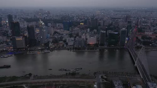 Ho Chi Minh City, Vietnam iconic Skyline and Saigon river waterfront aerial shot of bridge and key b