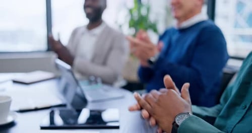 Business Team Applauding at Office Meeting