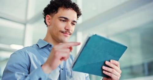 Tablet, scroll and reading with business man in office for seo report, email and research