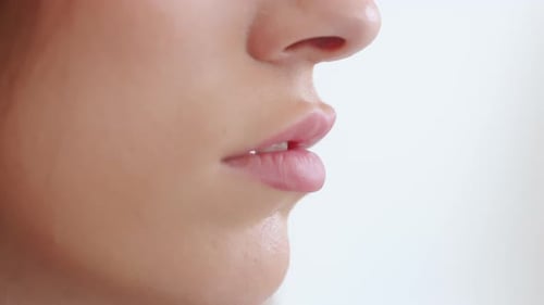 Closeup Of Woman's Lips With Fillers - Lip Filler Procedure.