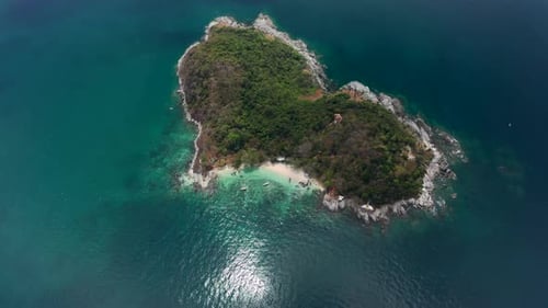 Heart shaped island in the calm tropical sea. Thailand