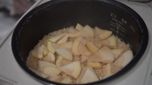 Steam rising from cooked rice