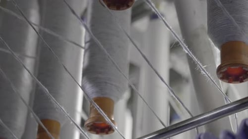 Cotton Thread Spun On A Spinning Machine In A Textiles Manufacturing Factory