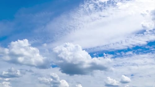 Beautiful cloudscape transformation in the sky. Cumulus and spindrift types of clouds