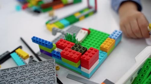 Robotics Programming Class Children Construct and Code Robot STEM Education Using Constructor Blocks