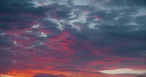 Red and crimson sunset cloudy sky.