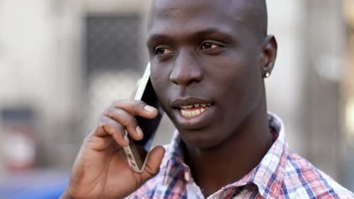 Man Talking on Phone Outside, Close Up