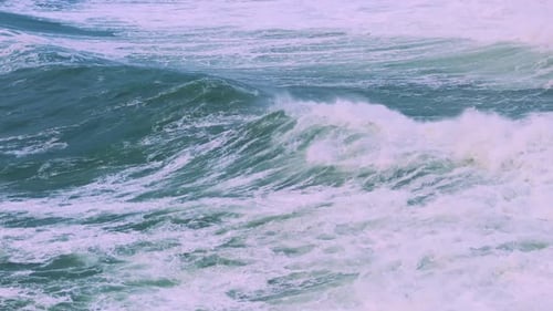 Powerful Ocean Waves Crashing Dramatically on Beautiful Shoreline