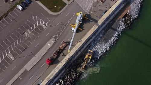 Aerial view of harbor construction site and equipment