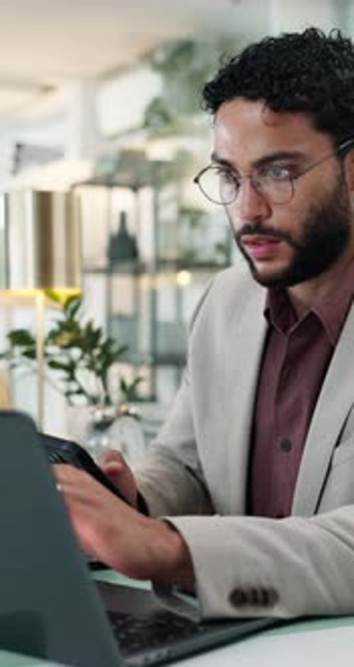 Businessman, laptop and phone with typing, social media and message for contact