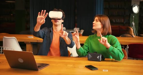 Man Exploring Virtual Reality with Woman Assistant Online Technology Concept