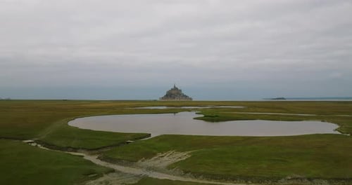 Fly Over Mont SaintMichel One of Europe's Most Unforgettable Sights Located in the Bay Where