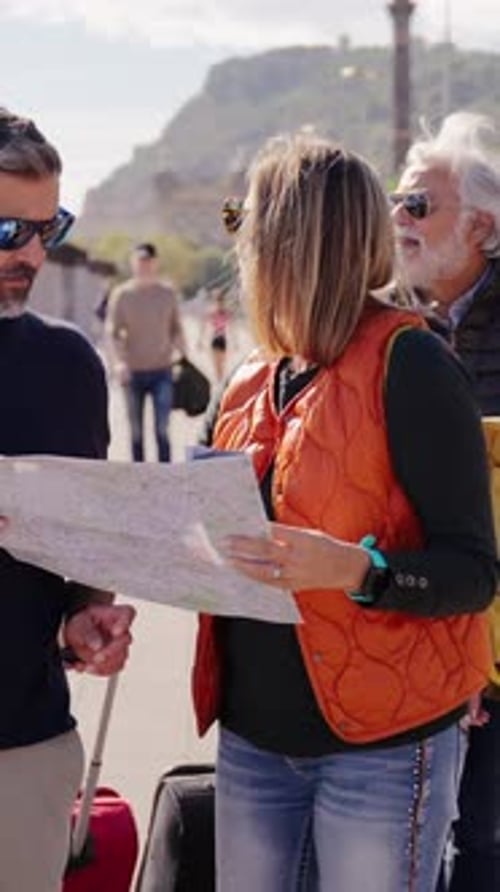 Tourists Consulting Map on Sunny City Street