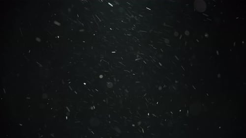 White particles moving fast in the air