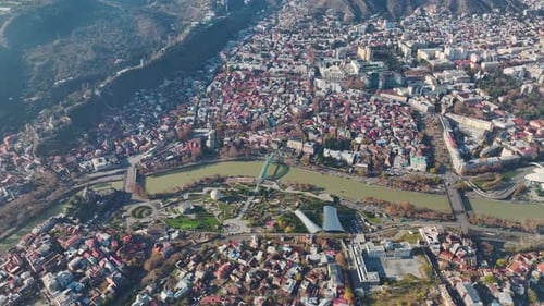 Aerial View Tbilisi's Urban Tapestry A Mesmerizing Cityscape at Dawn