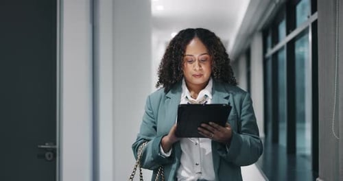 Tablet, research and business woman walking in office for project deadline at night