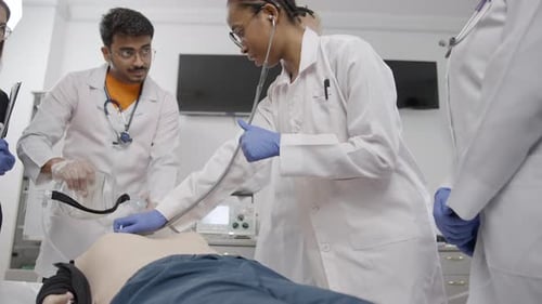 Medical Students Training on Dummy in Hospital